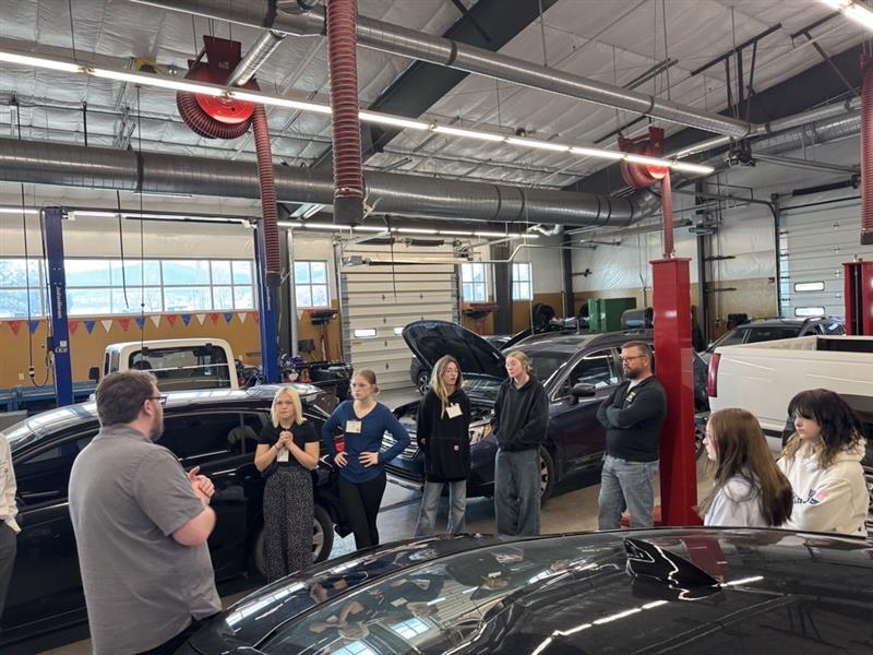 Students touring the Helena College's welding and automotive facilities.