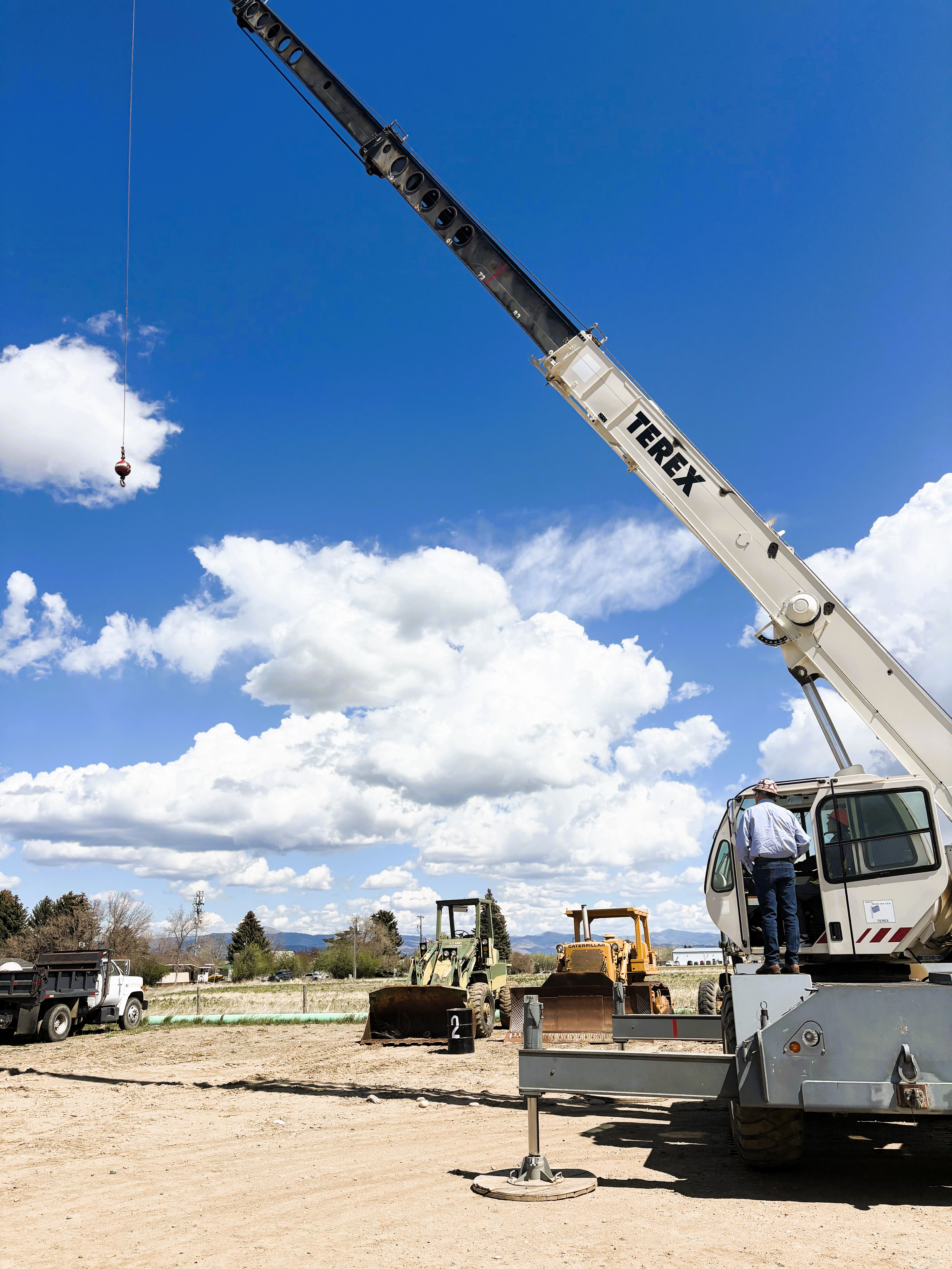 JMG student learning how to operate a crane.